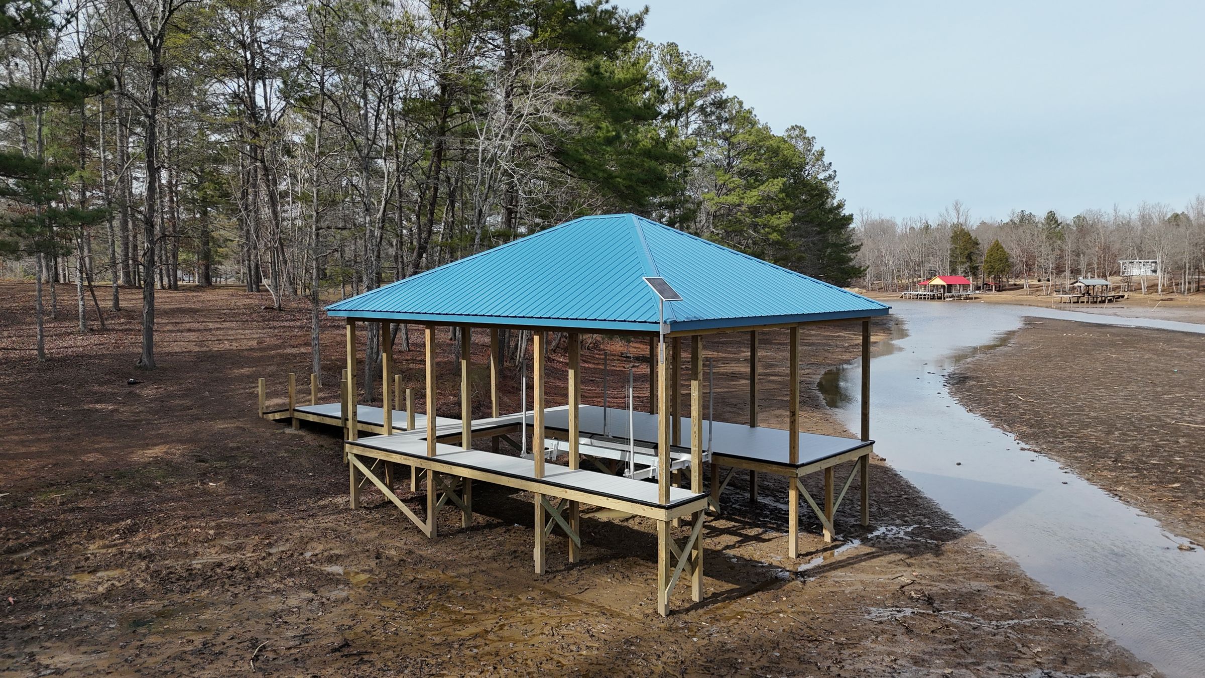 TVA 26a permitted open boathouse with metal roof built by Blue Horizon Docks and Decks