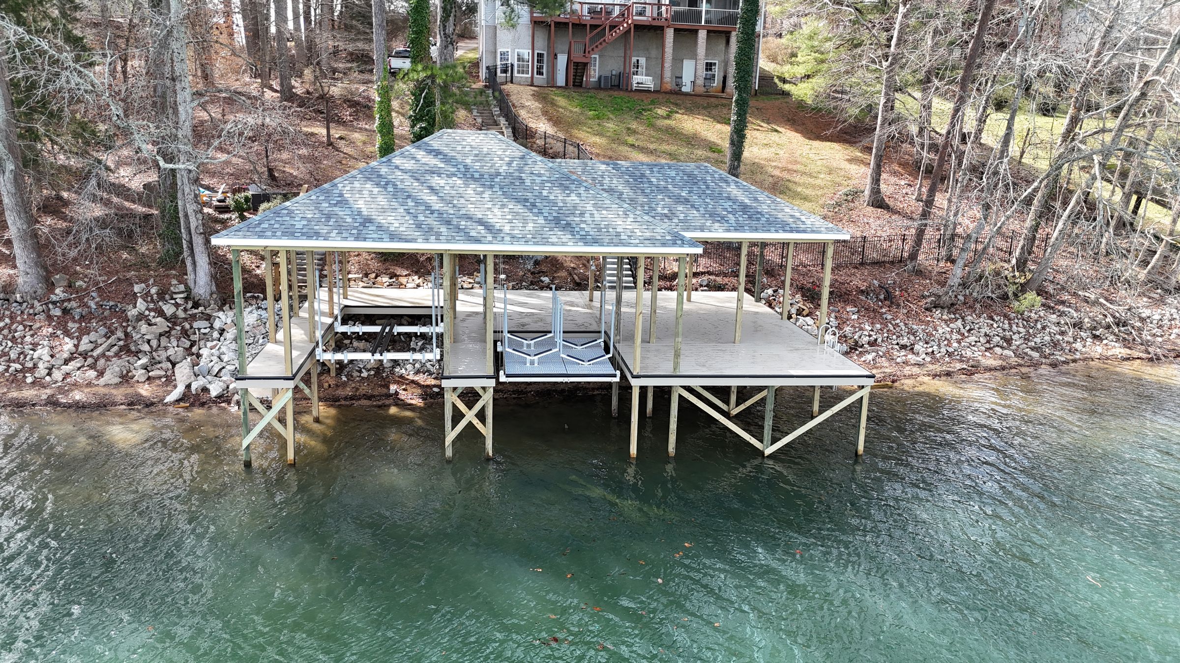 Aerial view of a finished open boathouse on a Tennessee lake by Blue Horizon Docks and Decks
