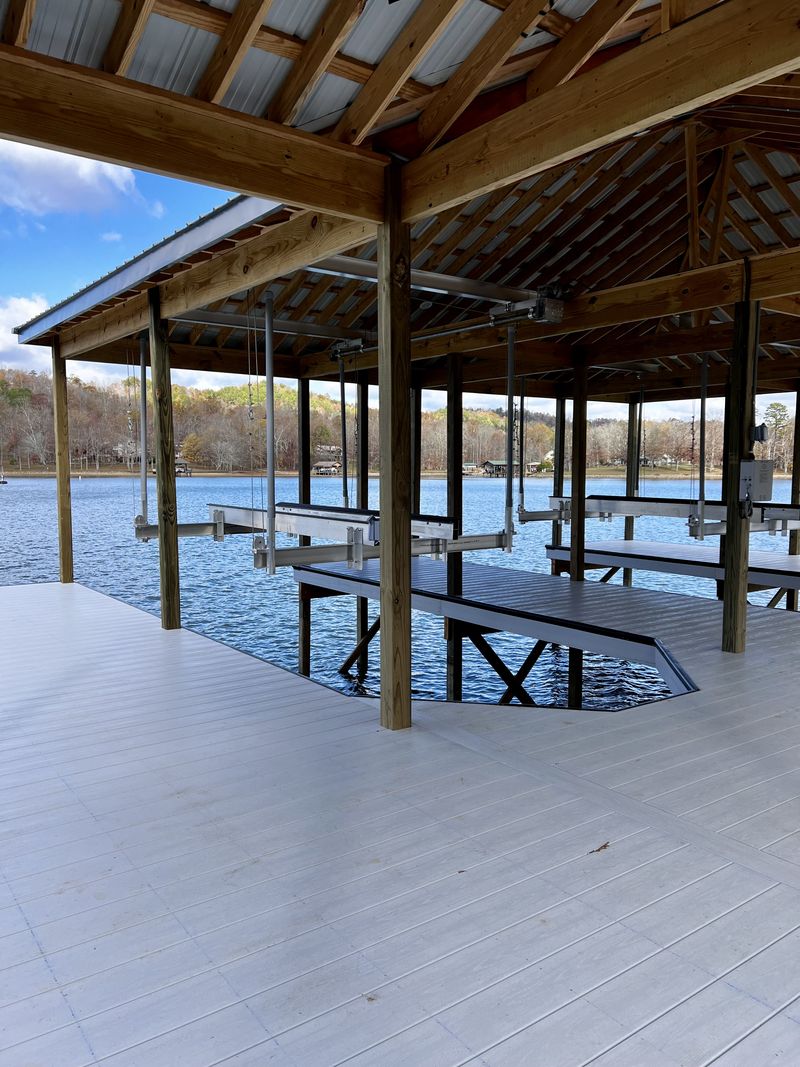 Interior of a covered boathouse built by Blue Horizon overlooking the water near Kingston, TN