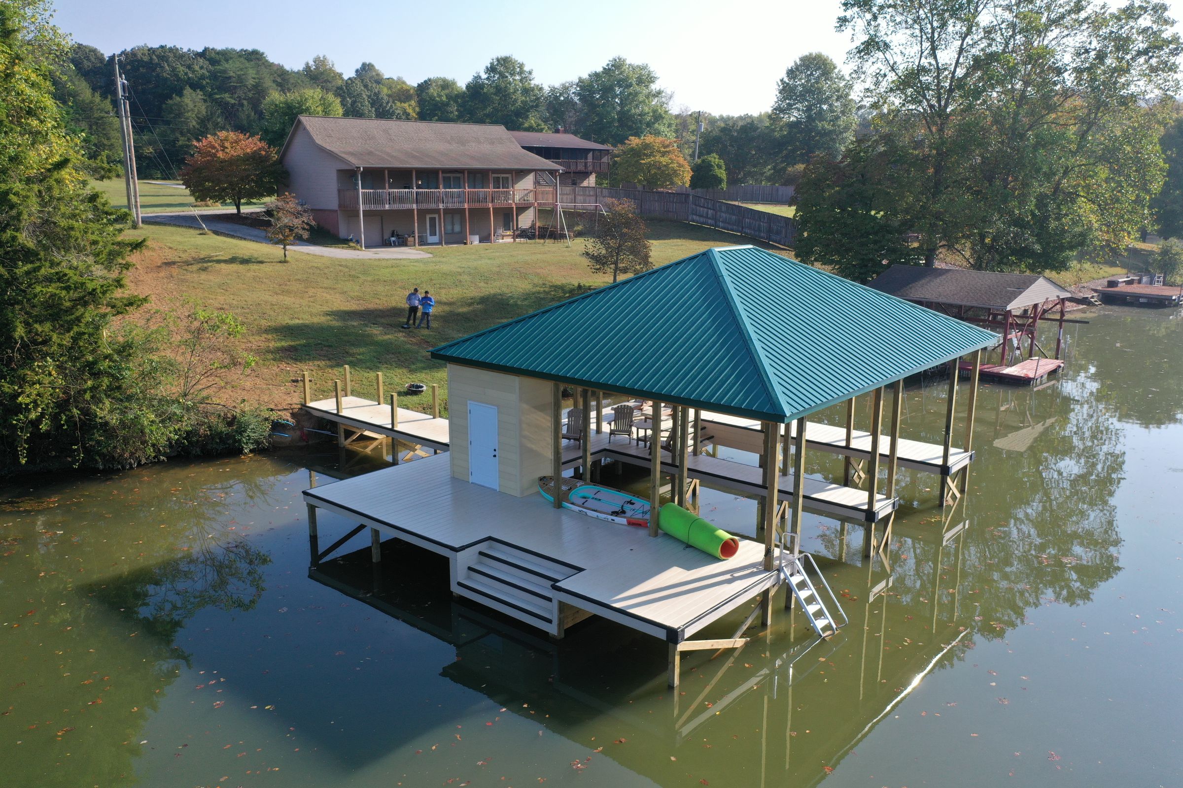 Aerial of a custom boathouse on the water near Lenoir City, TN — Blue Horizon Docks and Decks